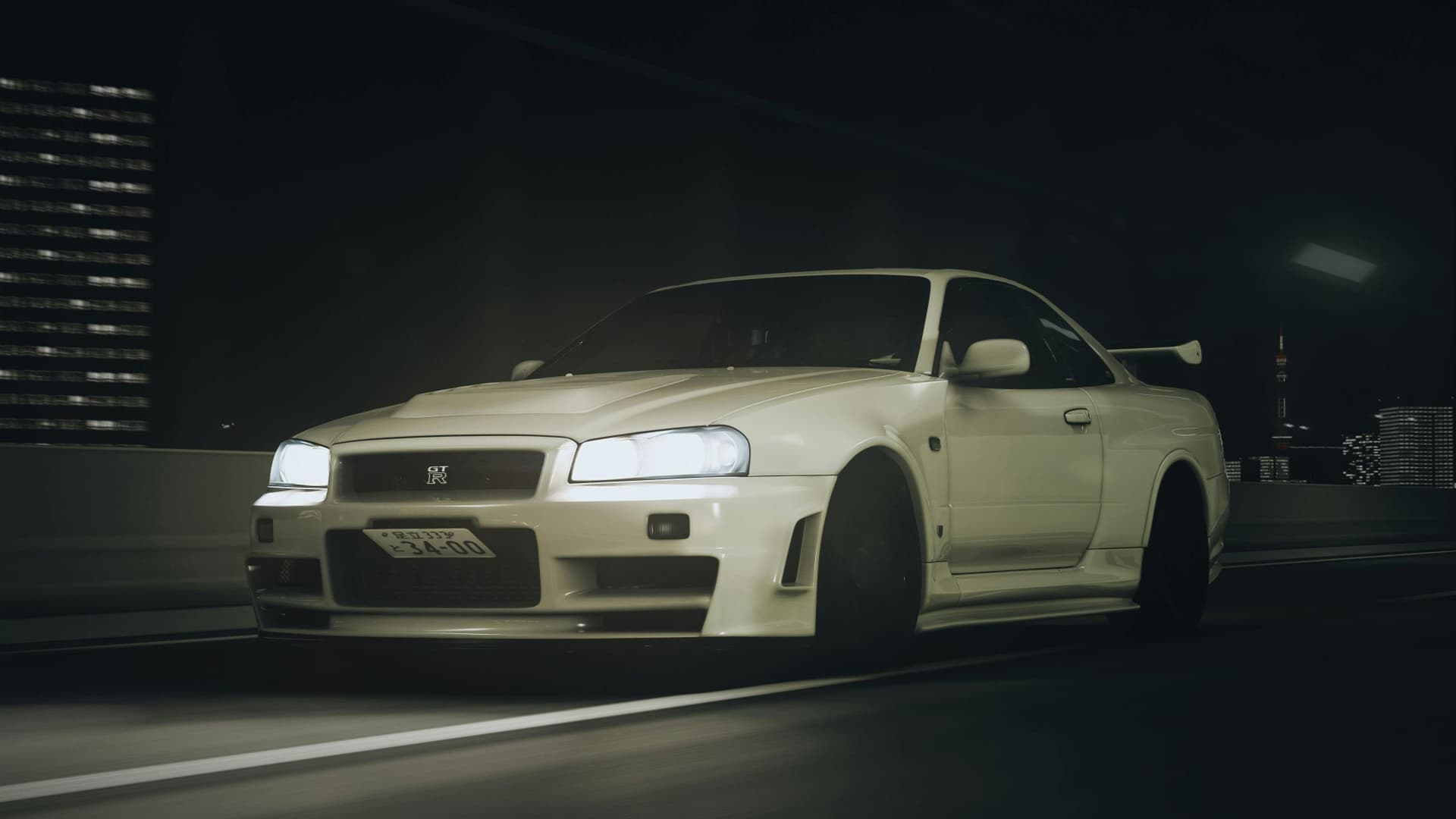 Nissan Skyline GT-R R34 on a Tokyo expressway at night