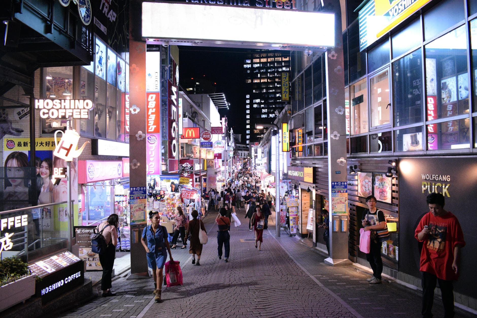 Takeshita Street at night with neon signs and crowds