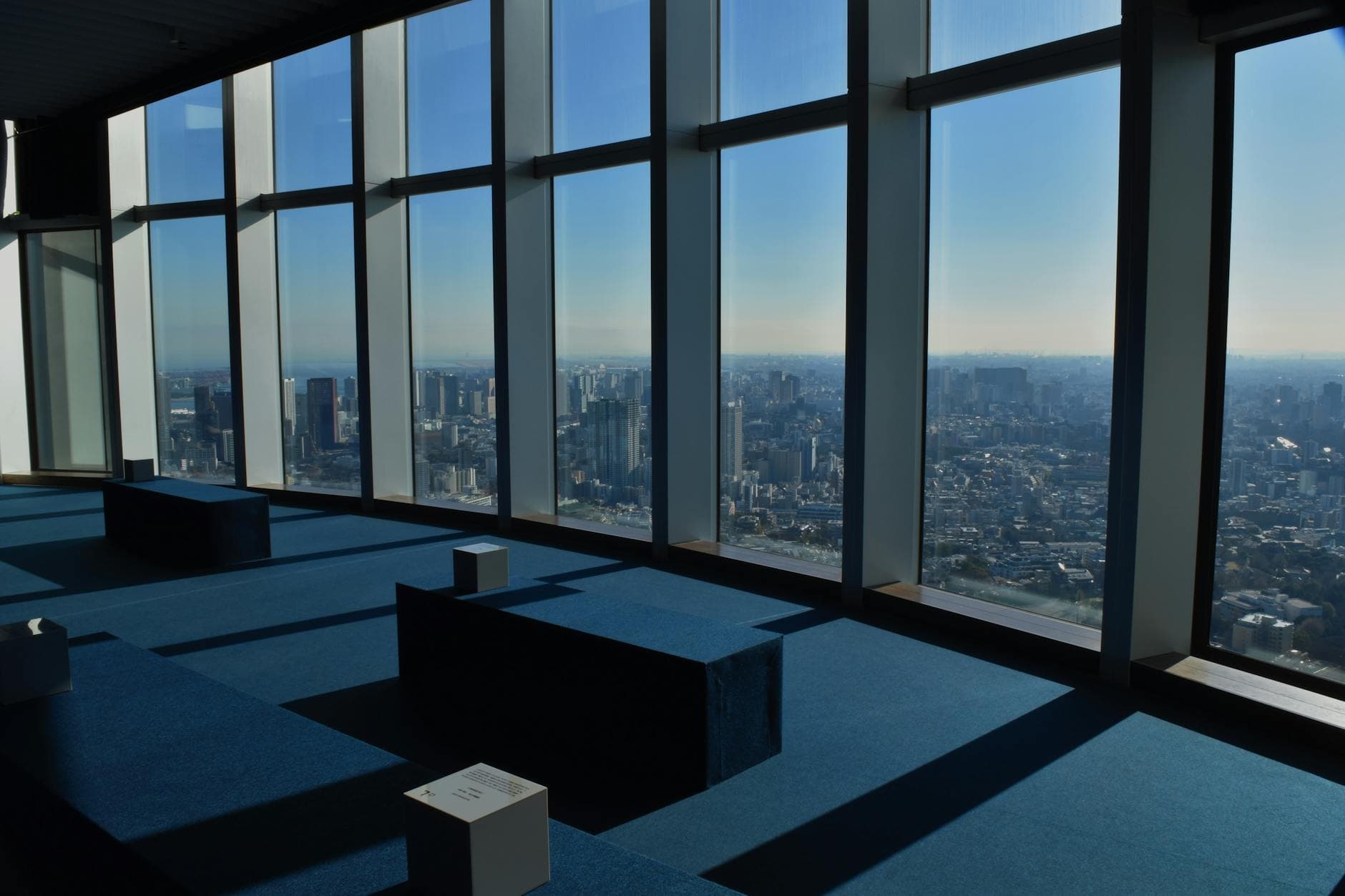 View of modern Tokyo skyscrapers from observation deck