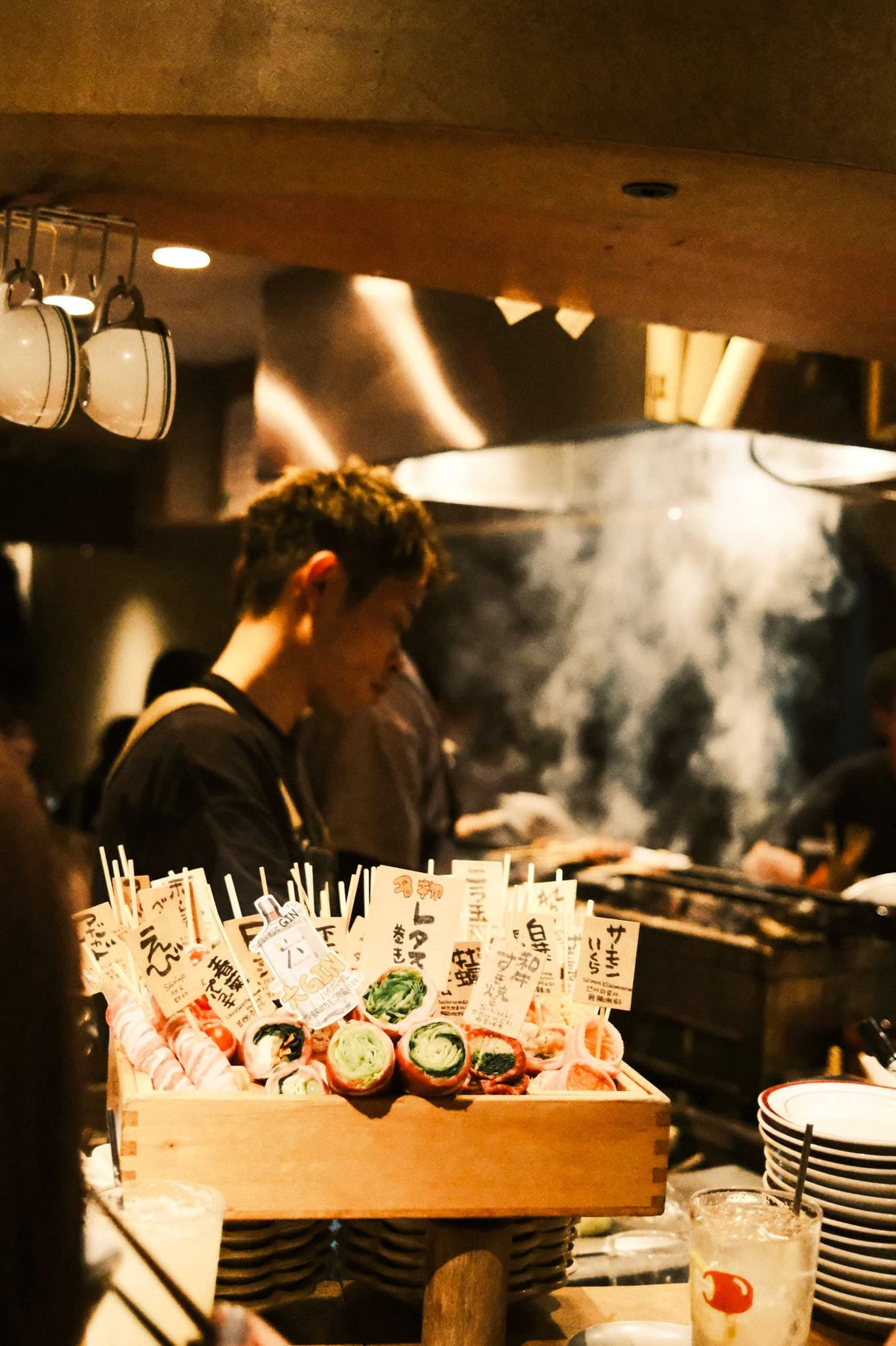 Sizzling yakitori skewers at izakaya