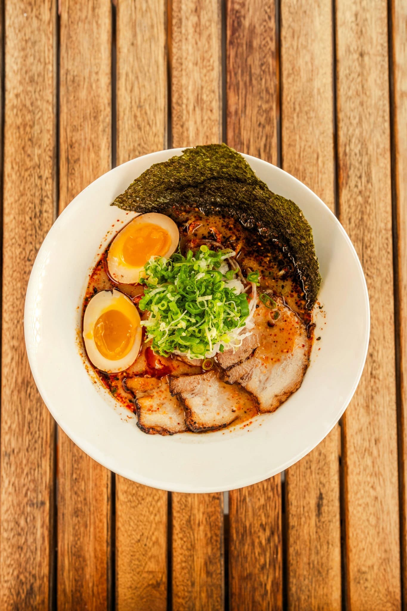 Steaming bowl of ramen noodles