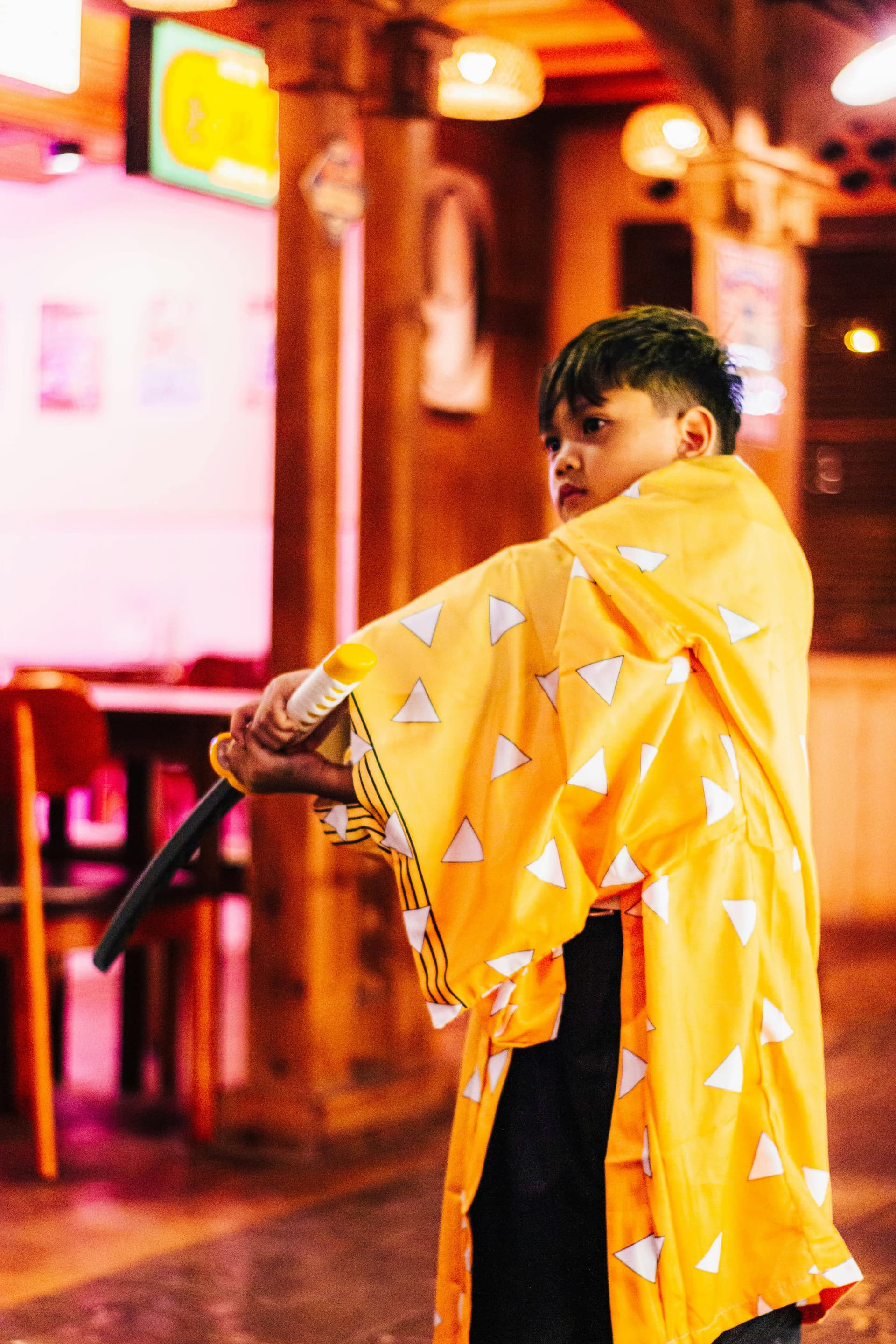 Kids trying on cosplay outfits