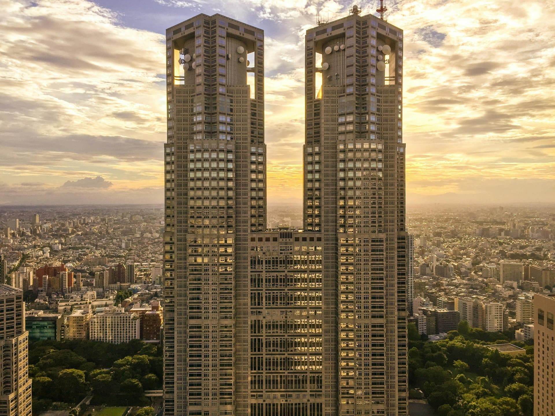 Tokyo Metropolitan Government Building at golden-hour sunset - guide shares hidden viewpoints
