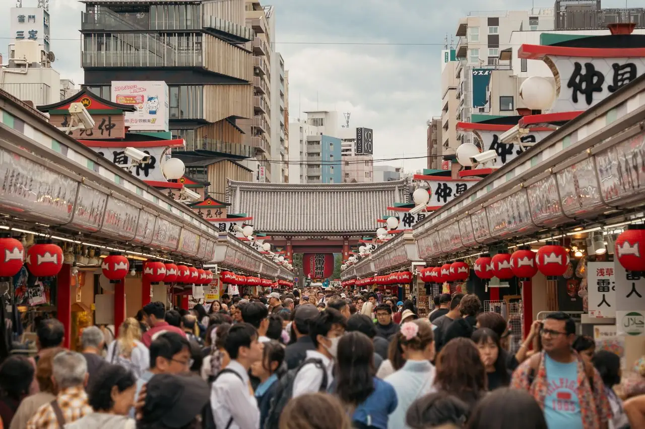 Dense crowds of visitors filling Nakamise Street on the approach to Senso-ji
