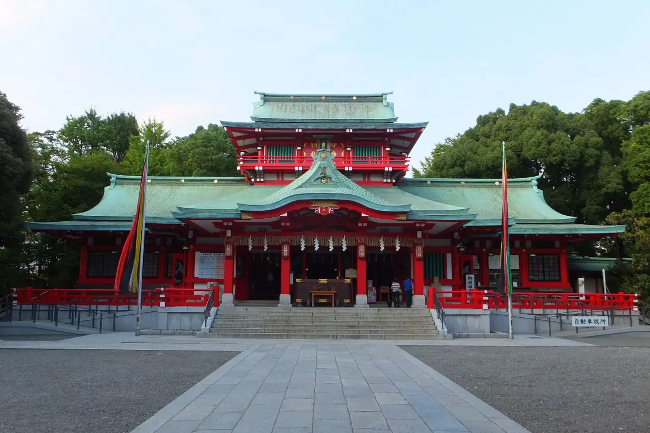 Vermilion main hall of Tomioka Hachimangu shrine in Monzen-Nakacho on a clear day