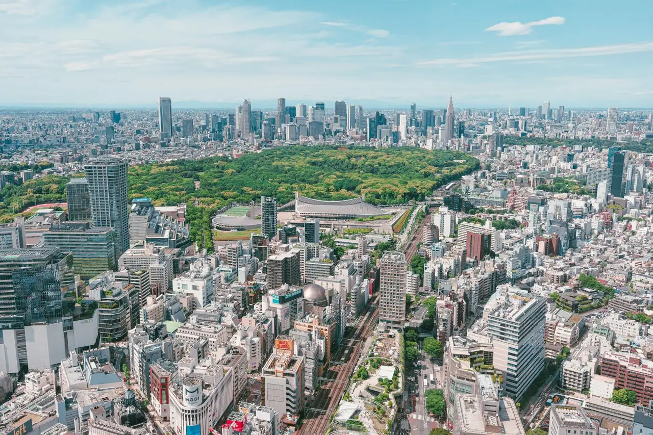 View from Shibuya Sky over Yoyogi Park toward the Shinjuku skyline