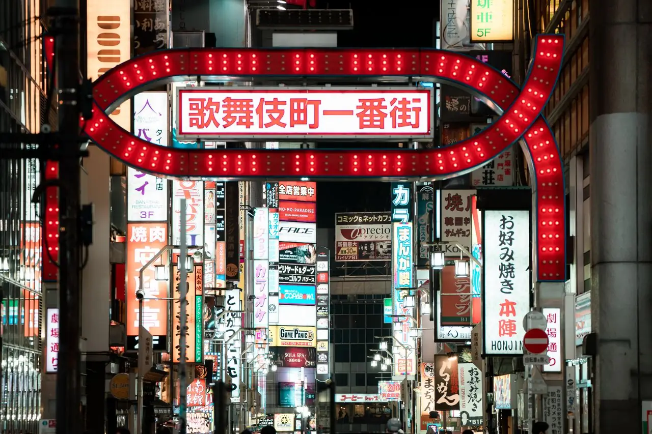 Red neon Kabukicho Ichibangai gate in Shinjuku at night