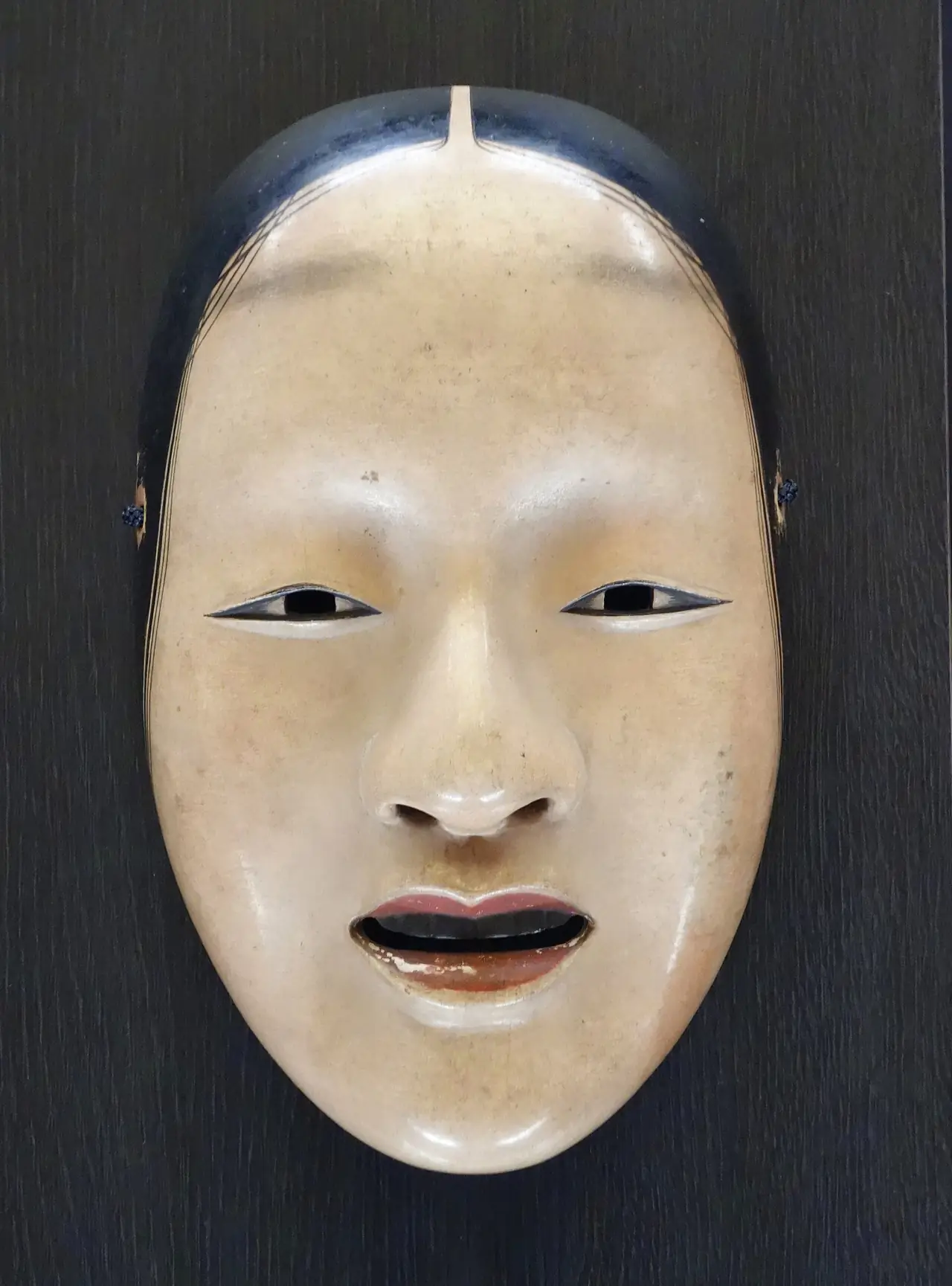 Edo-period Zo-onna Noh mask carved in wood at the Tokyo National Museum