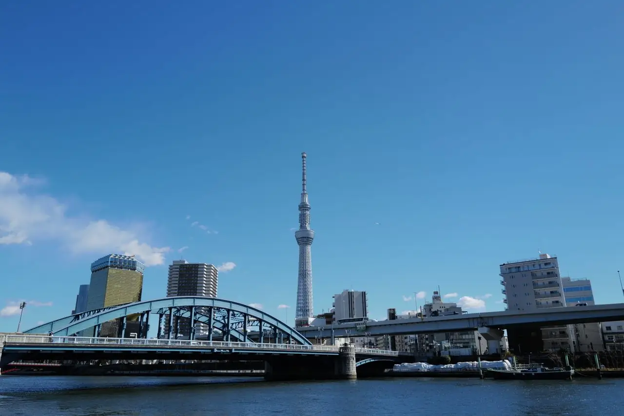 Tokyo Skytree rising beyond the arched Komagata Bridge over the Sumida River