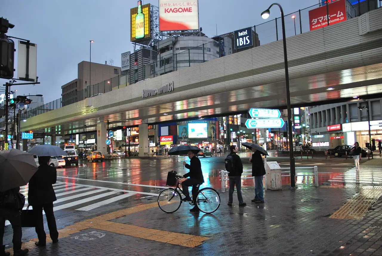 Roppongi Crossing under the elevated expressway on a rainy evening