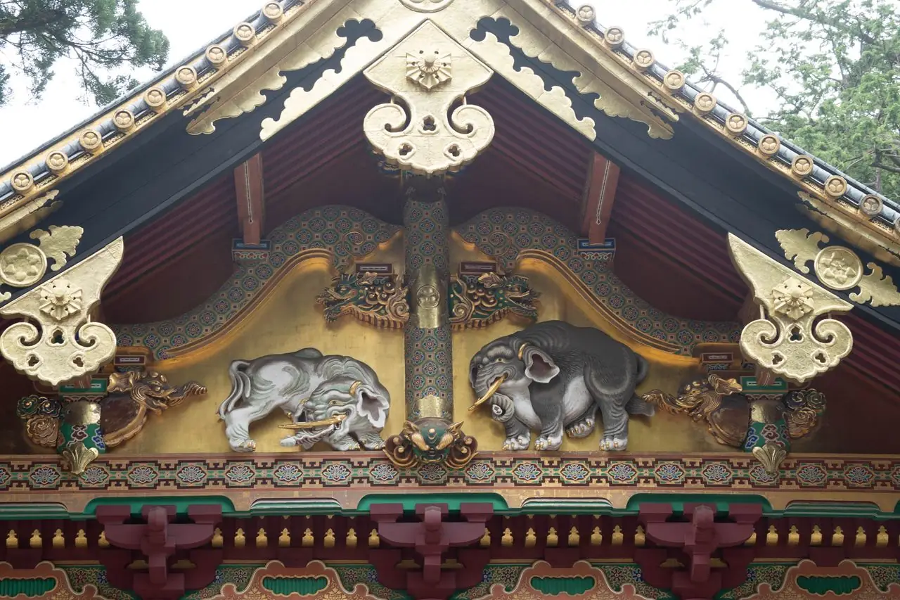 Carved imagined elephants on the gable of a storehouse at Nikko Toshogu