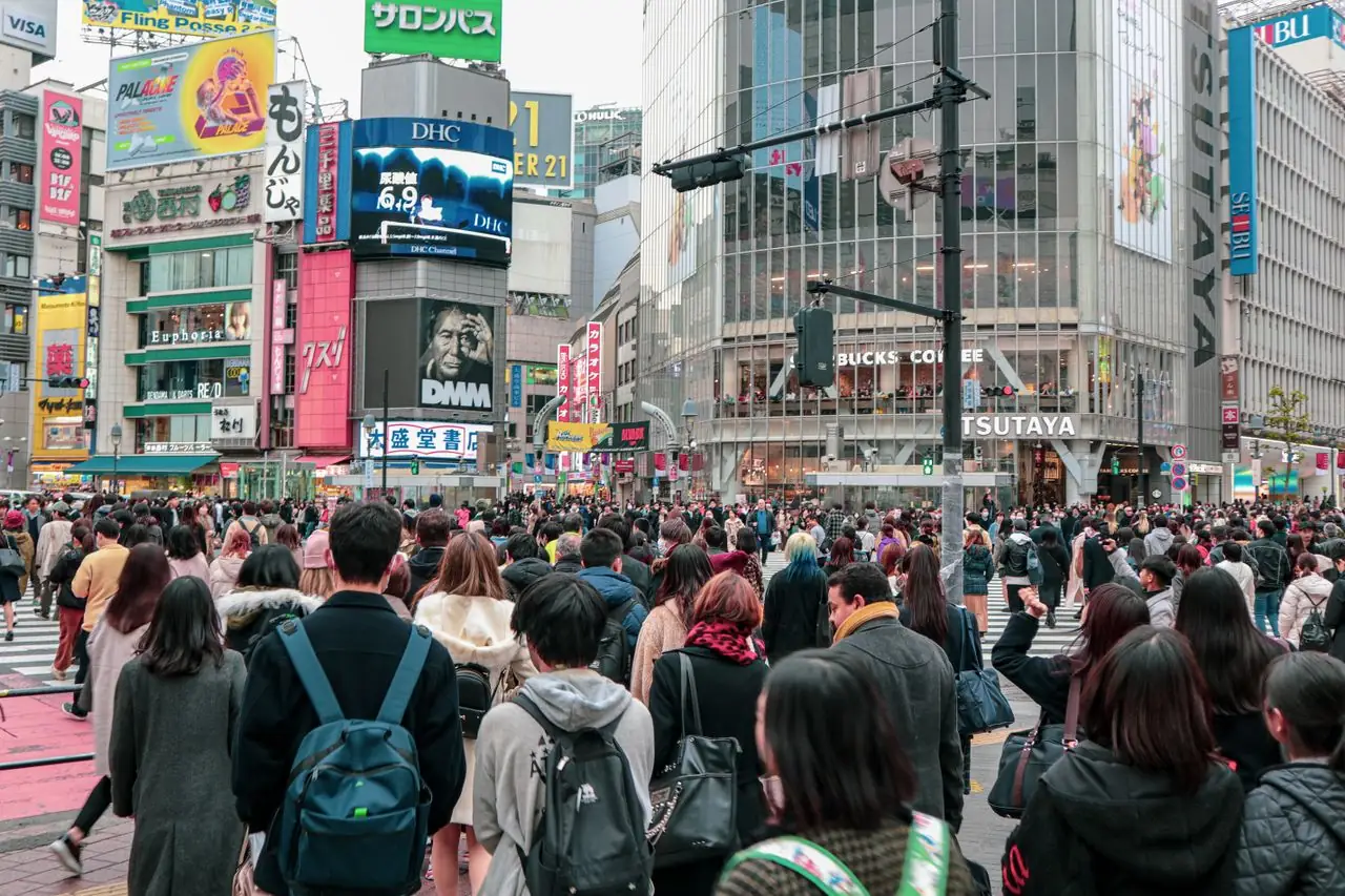 Afternoon crowds crossing the Shibuya Scramble in front of Tsutaya