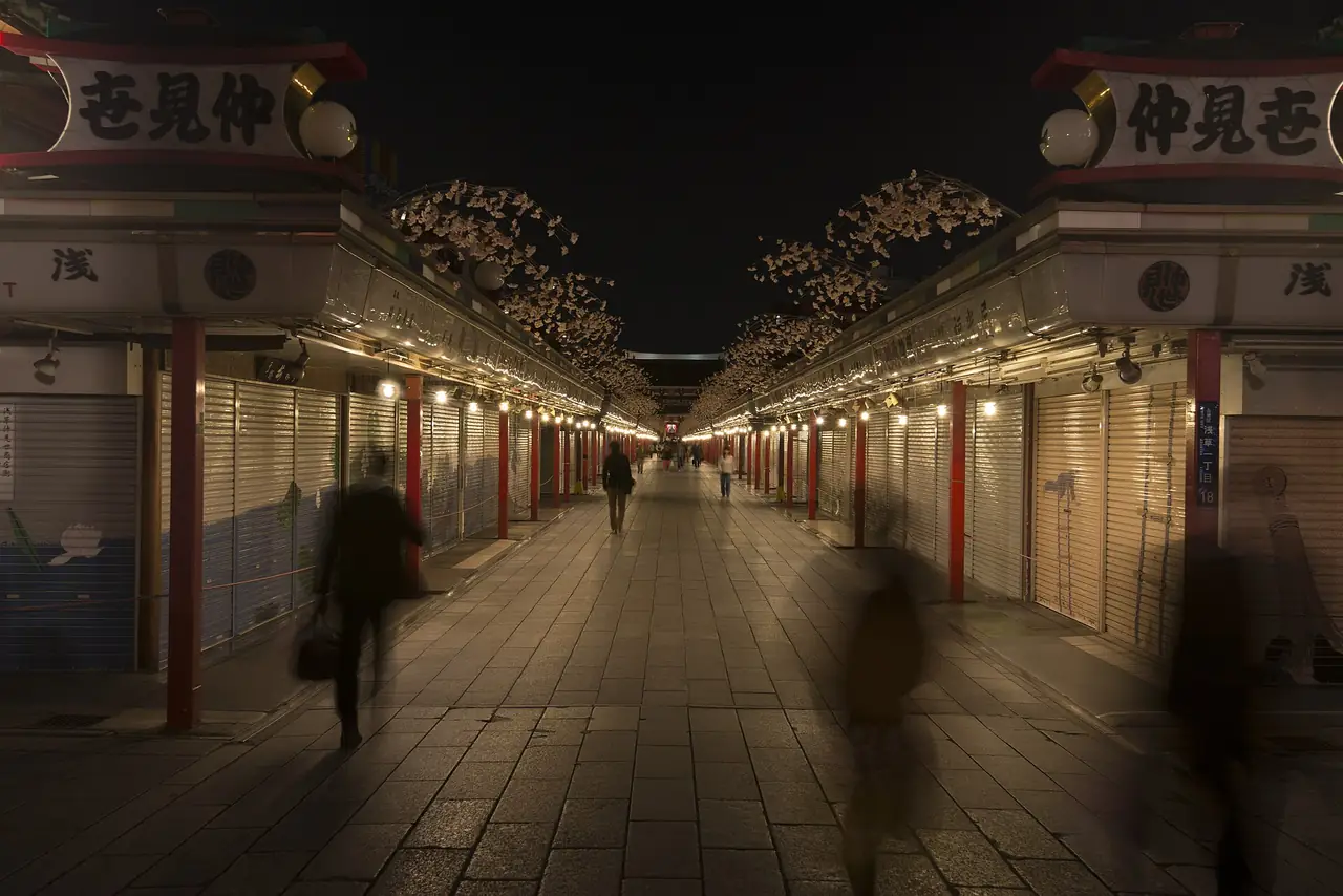 Nakamise shopping street at night with the shop shutters pulled down