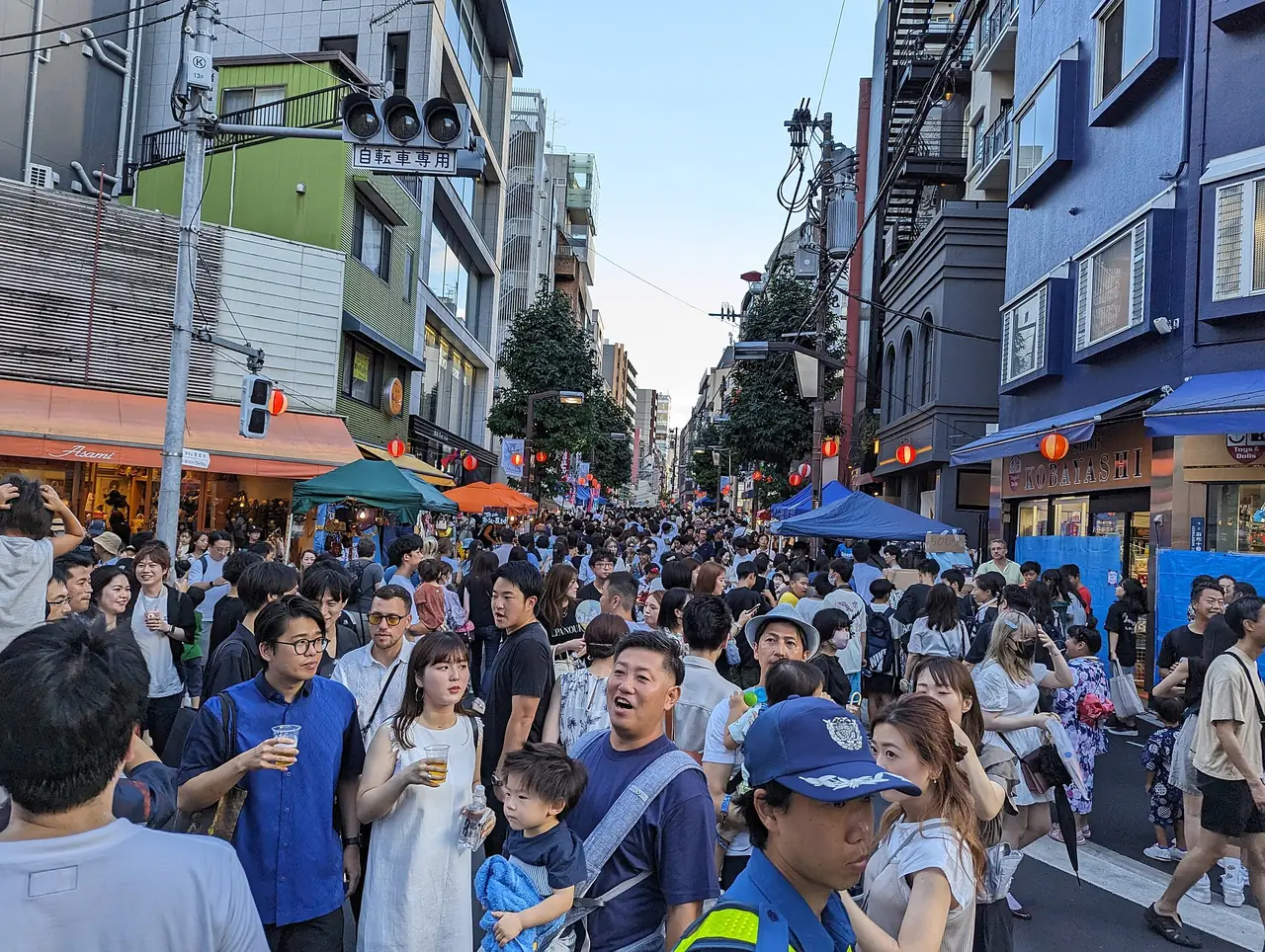 Crowds filling an Azabu-Juban street during the Noryo Matsuri in August